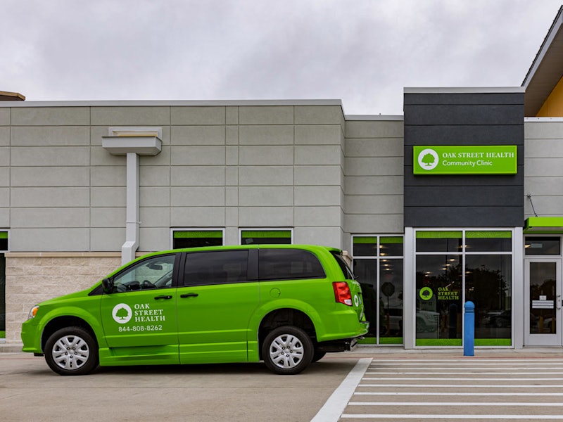 An Oak Street Health van parked outside the Carrollton primary care clinic in Carrollton, Texas.