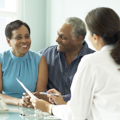 older couple consulting with their doctor