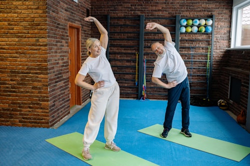 Elderly People Doing Stretches