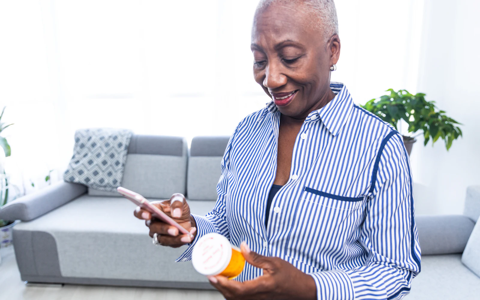 older woman reviewing her medication label