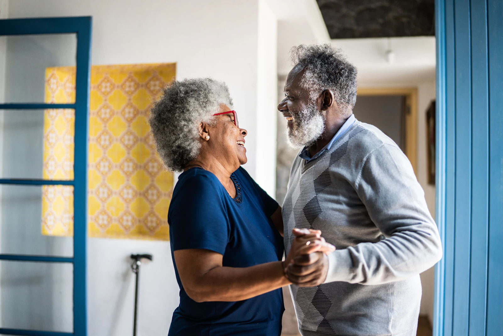 couple dancing in the living room