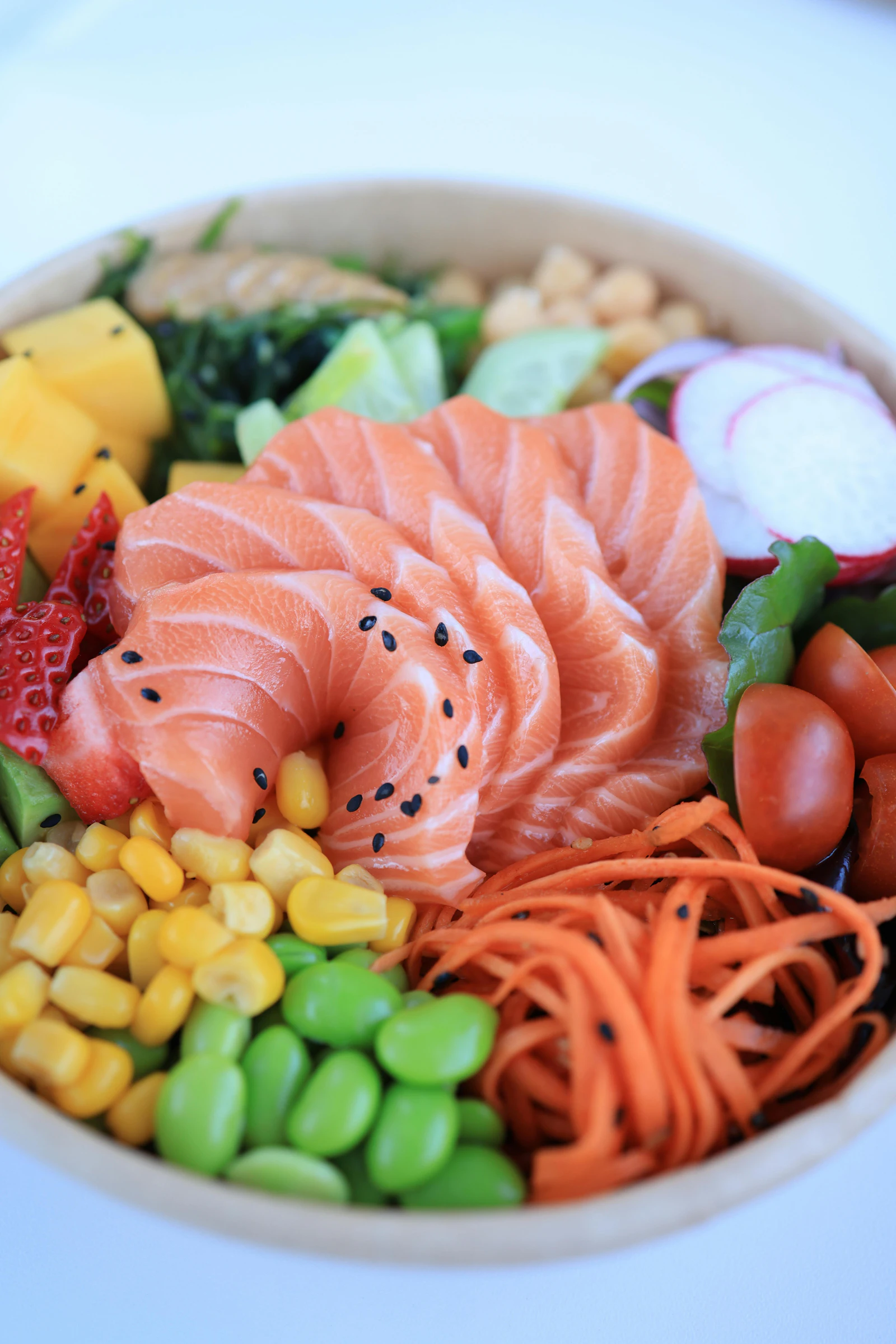 poke bowl with salmon and vegetables
